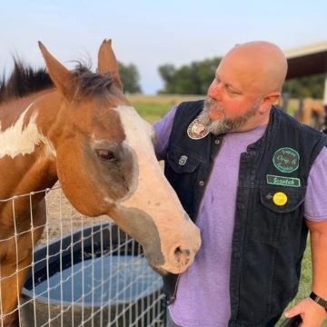 Gerald Peake, Psychiatric Mental Health Nurse Practitioner, advocates for animals and humans alike.