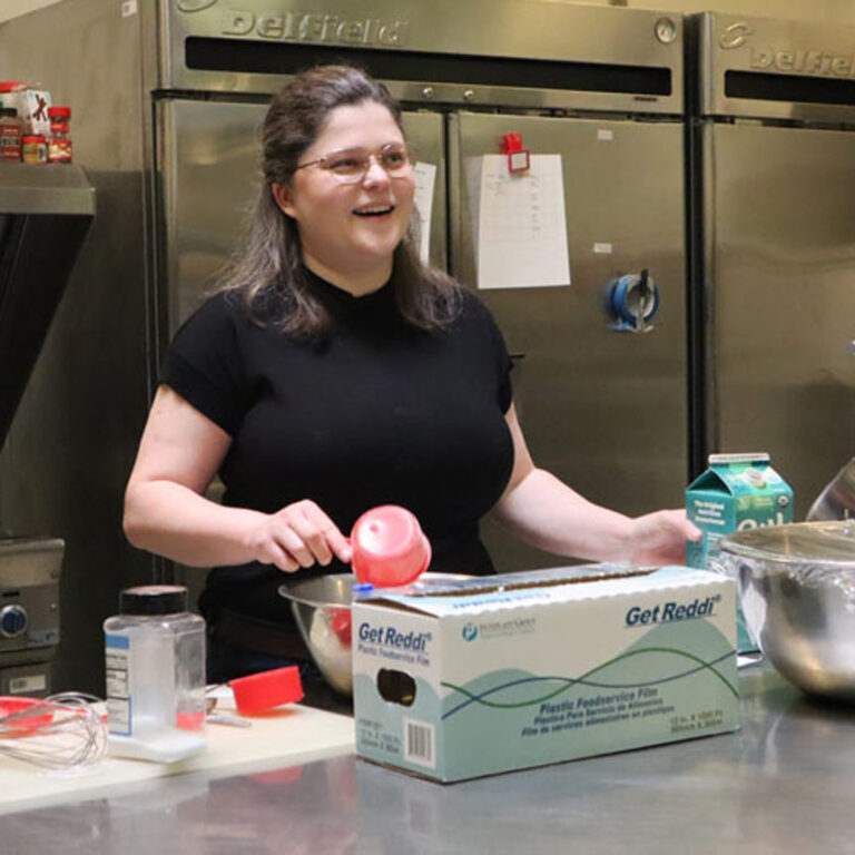 Bryanna Hanson serves at Kitchen Manager at St. John's Children's Relief Nursery.