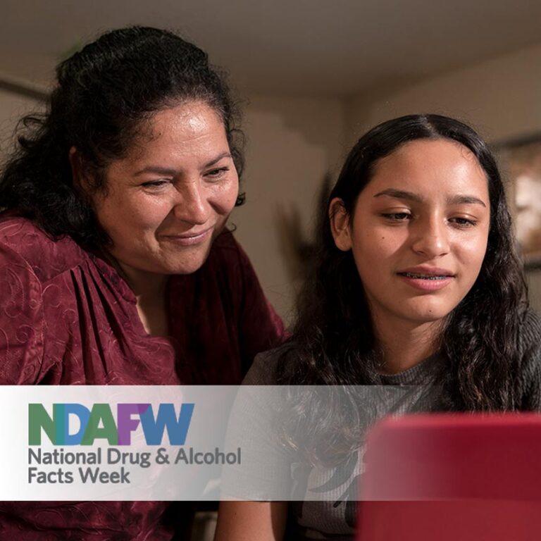 A mom and teenager look at a computer together with the logo for NDAFW (National Drugs and Alcohol Facts Week) displays across the bottom of the image.